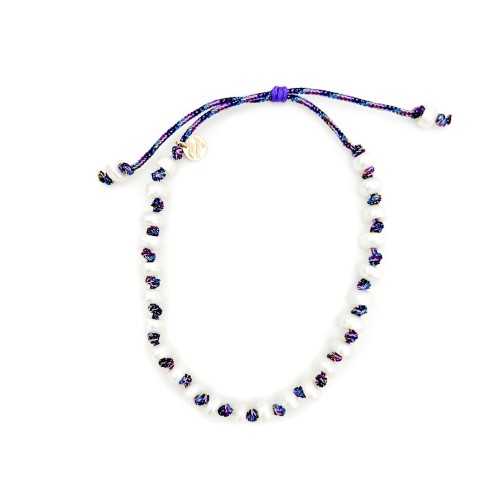 Fresh pearl bracelet on purple cord